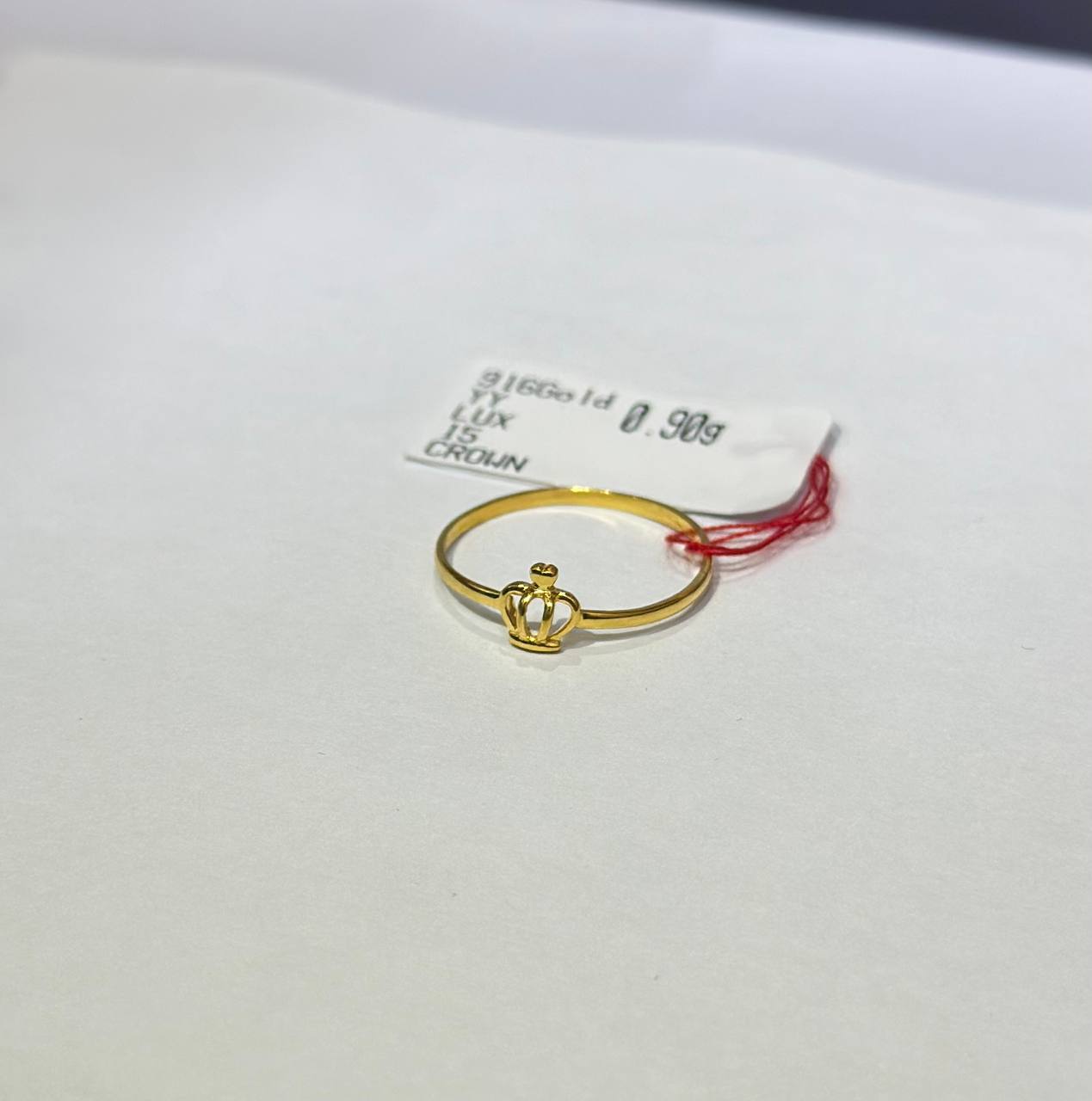 "crown design 916 ring with a crown design on a white background"