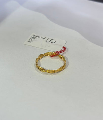 "Filigree 916 gold ring with a tag displaying weight on a white background"
